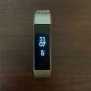 Fitbit Alta HR with 12 bands. Charger included.
